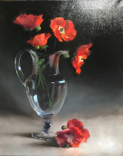 Poppies in a glass vase