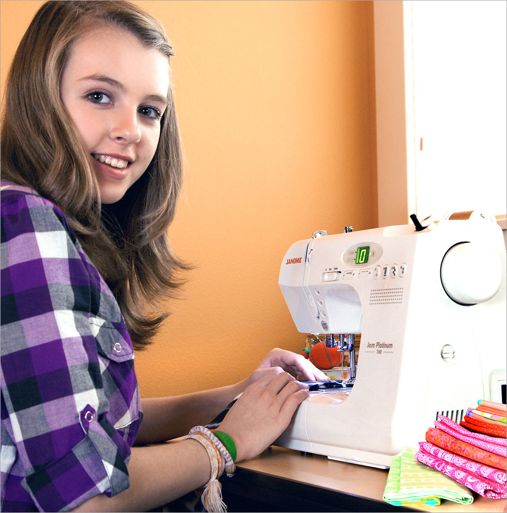 Teen with a sewing machine