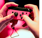 hands with video game controller