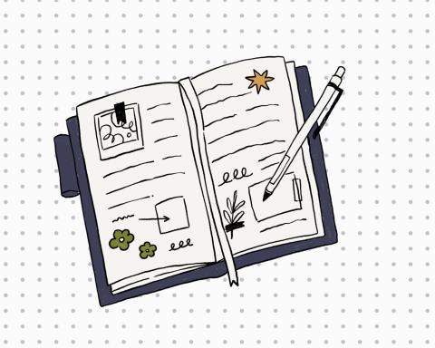 image of journal on top of dotted paper