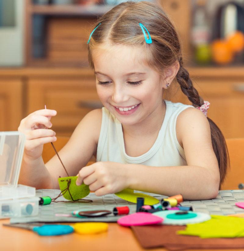 Girl sewing