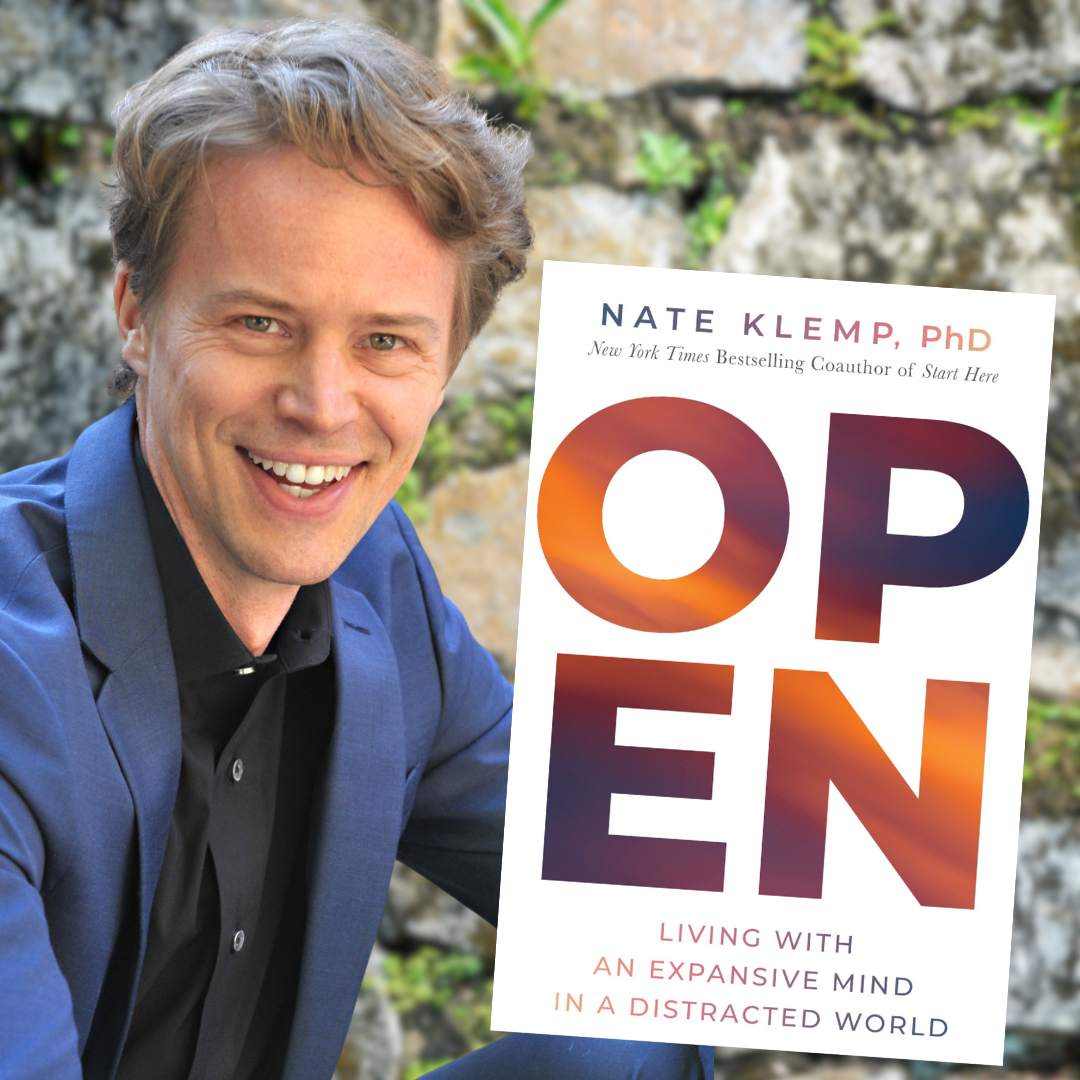 author nate klemp with his book open