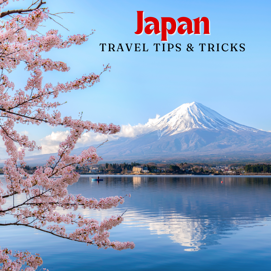 scenic image of Mt. Fuji in Japan with cherry blossom branches in the foreground