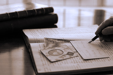 Hand writing in a journal